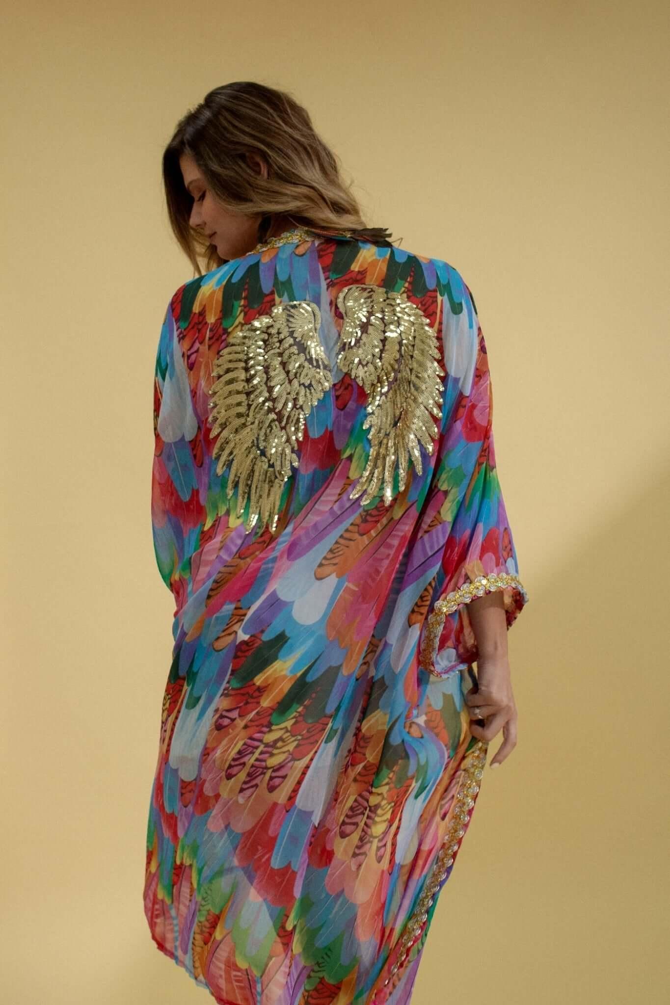 Colorful beach Kimono in chiffon fabric decorated with sequin gold angel wings. Perfect kimono cardigan to wear at the beach, festivals Tulum, Ibiza, Mykonos and Raves
